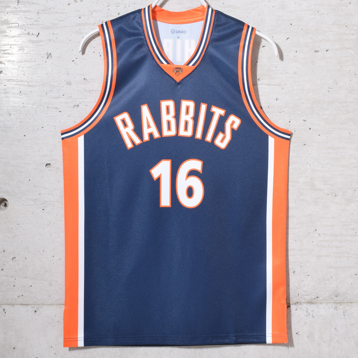 トリプルラインがクールなネイビー×オレンジユニフォーム | 作成事例